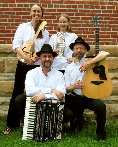 Photo of Ensemble M’chaiya (tm) as a quartet - From left to right: (standing) Jutta Distler, Zo&iuml; Doehrer, (kneeling) Terran Doehrer, Velizar Shumanov. Photo &copy; 2009 Modal Music, Inc. (tm) All rights reserved.